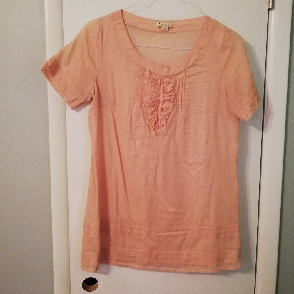 Sheer pink tuxedo-front tunic tee